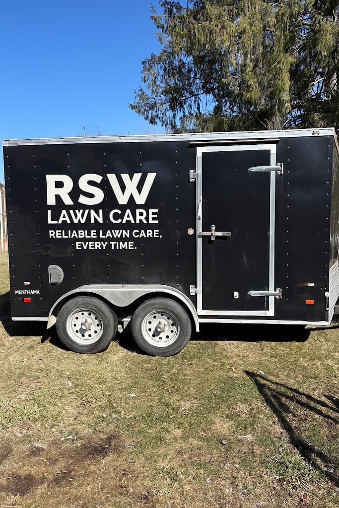 RSW Lawn Care enclosed trailer with company signage
